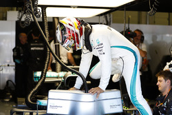 Lewis Hamilton, Mercedes AMG F1, climbs in to his car