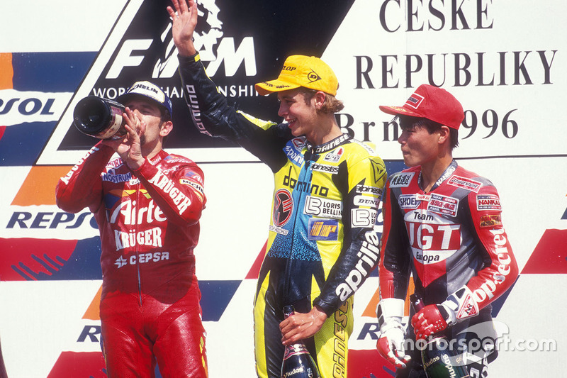 Podium: race winner Valentino Rossi, Aprilia, second place Jorge Martinez, Aprilia, third place Tomo