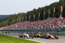 Fernando Alonso, McLaren MCL32, battles, Nico Hulkenberg, Renault Sport F1 Team RS17, Esteban Ocon,