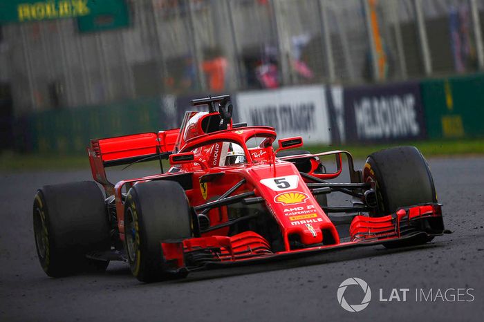 Sebastian Vettel, Ferrari SF71H, celebrates in his cockpit after winning the race