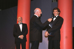 Ayrton Senna receives his award from Murray Walker
