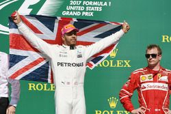 Race winner Lewis Hamilton, Mercedes AMG F1 celebrates on the podium with the union flag and Kimi Raikkonen, Ferrari