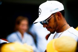 Lewis Hamilton, Mercedes AMG F1, signs autographs for fans