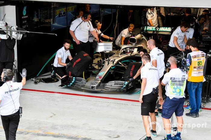 The Mercedes team prepare to launch Lewis Hamilton, Mercedes AMG F1 W10, from the garage