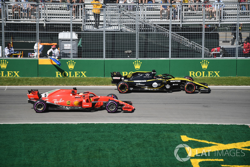 Nico Hulkenberg, Renault Sport F1 Team R.S. 18 and Sebastian Vettel, Ferrari SF71H