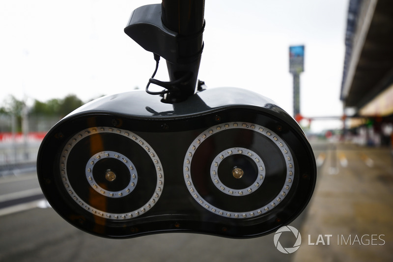 Pit lights belonging to the Haas team in the pit lane