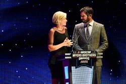 Martin Truex Jr., Furniture Row Racing, and girlfriend Sherry Pollex speak on stage after accepting the Myers Brothers Award