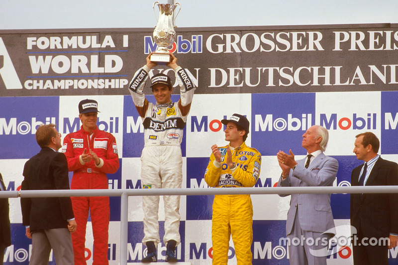 Podium: race winner Nelson Piquet, Williams, second palce Stefan Johansson, McLaren, third place Ayrton Senna, Team Lotus