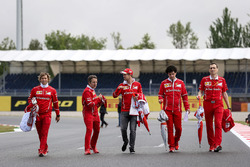 Sebastian Vettel, Ferrari and Riccardo Adami, Ferrari Engineer walk the track