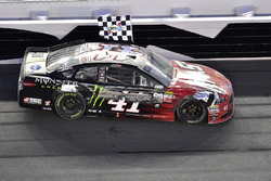 Kurt Busch, Stewart-Haas Racing Ford, celebrates after winning the Daytona 500