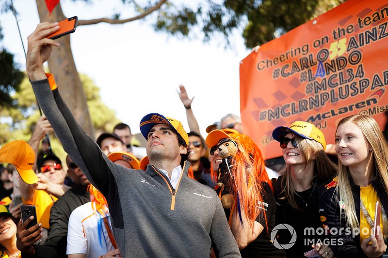 Carlos Sainz Jr., McLaren, signs autographs for fans