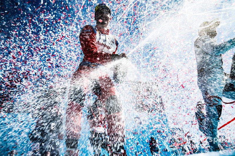 Pascal Wehrlein, Mahindra Racing, celebrates his maiden podium finish on the podium