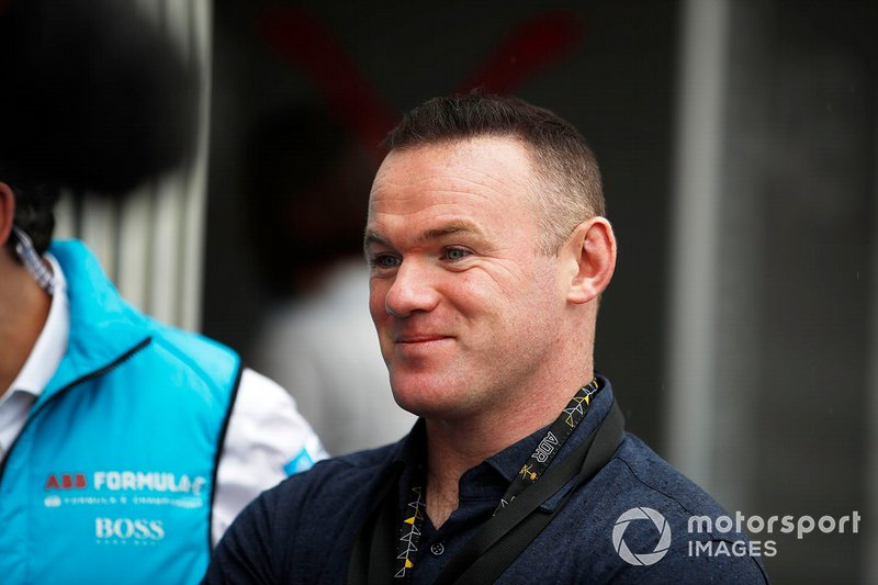 Footballer Wayne Rooney in the pit lane