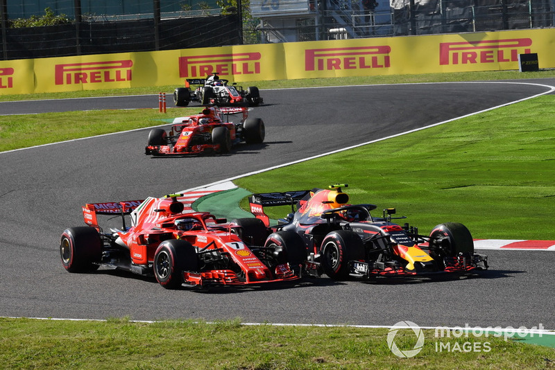 Kimi Raikkonen, Ferrari SF71H and Max Verstappen, Red Bull Racing RB14