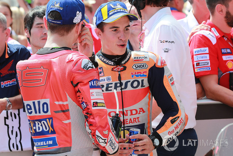 Ganador de la pole Marc Marquez, Repsol Honda Team, tercero Jorge Lorenzo, Ducati Team