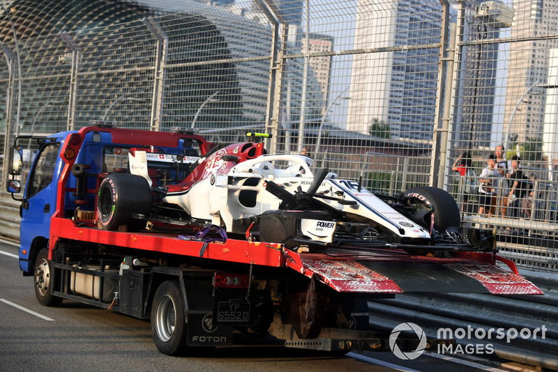 The crashed car of Charles Leclerc, Sauber C37 is recovered in FP1