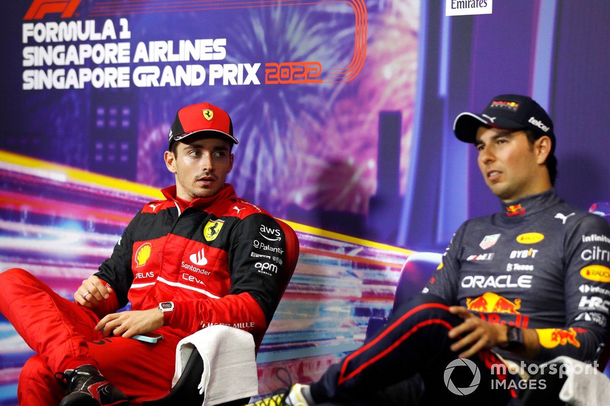 Charles Leclerc, Ferrari, 2nd position, with Sergio Perez, Red Bull Racing, 1st position, in Parc Ferme