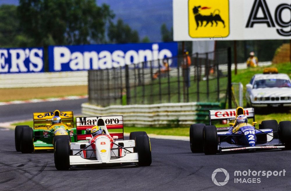 Ayrton Senna, McLaren MP4-8, leads Alain Prost, Williams FW15C, and Michael Schumacher, Benetton B193A