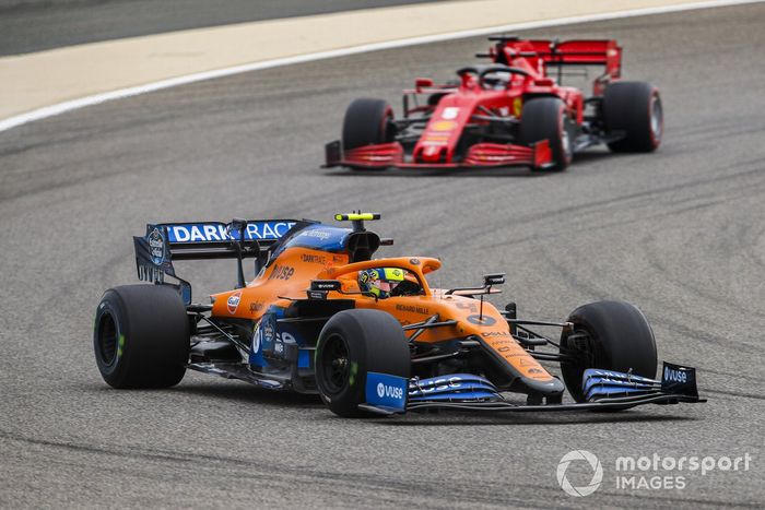 Lando Norris, McLaren MCL35, Sebastian Vettel, Ferrari SF1000