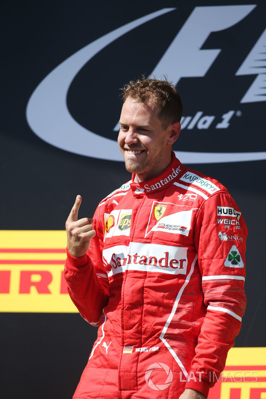 Podium: race winner Sebastian Vettel, Ferrari