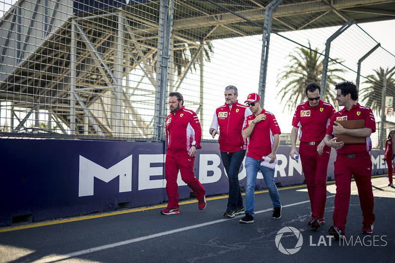 Sebastian Vettel, Ferrari walks the track with Maurizio Arrivabene, Ferrari Team Principal and Riccardo Adami, Ferrari Race Engineer