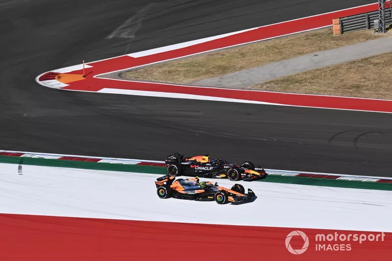 Lando Norris, McLaren MCL38, battles with Max Verstappen, Red Bull Racing RB20 