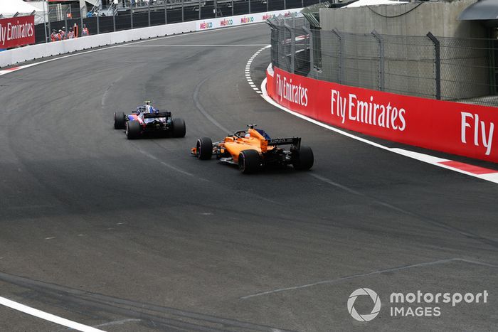 Fernando Alonso, McLaren MCL33 and Pierre Gasly, Scuderia Toro Rosso STR13 