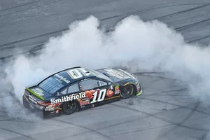 Aric Almirola, Stewart-Haas Racing, Ford Fusion Smithfield Bacon for Life celebrates his win Charlotte Kinrade