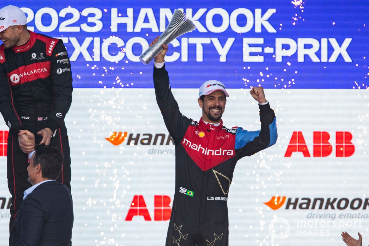 Lucas di Grassi, Mahindra Racing, 3rd position, lifts his trophy