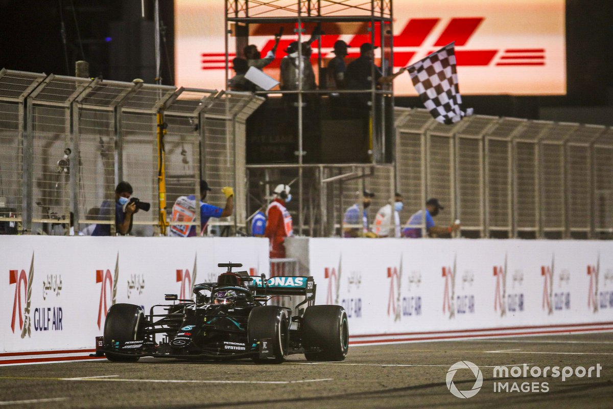 Race winner Lewis Hamilton, Mercedes F1 W11 crosses the finish line