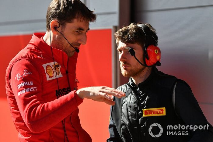 A Ferrari and Pirelli engineer in discussion