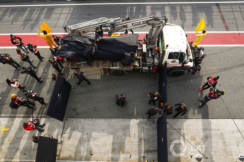 The McLaren MCL33 of Fernando Alonso is returned to the pits