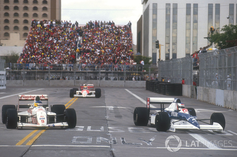 Jean Alesi Tyrrell 018 Ford prend un tour à Michele Alboreto, Arrows A11B Ford devant Ayrton Senna, Mclaren MP4/5B Honda