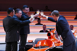 Yusuke Hasegawa, Senior Managing Officer, Honda, Zak Brown, Executive Director of McLaren Technology Group, Eric Boullier, Racing Director, McLaren, and presenter Simon Lazenby toast the McLaren MCL32
