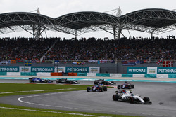 Lance Stroll, Williams FW40, Carlos Sainz Jr., Scuderia Toro Rosso STR12, Pierre Gasly, Scuderia Toro Rosso STR12, on the formation lap