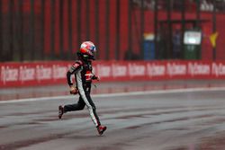 Romain Grosjean, Haas F1 Team heads back to the pits after he crashed on the way to the grid
