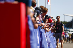 Romain Grosjean, Haas F1 Team, signs autographs for fans