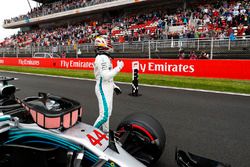 Pole winner Lewis Hamilton, Mercedes AMG F1, acknowledges fans after qualifying