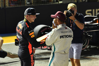 Pole sitter Lewis Hamilton, Mercedes AMG F1 and Max Verstappen, Red Bull Racing celebrate in parc ferme