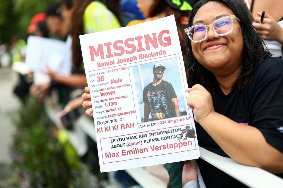 A fan holds up a sign of Daniel Ricciardo