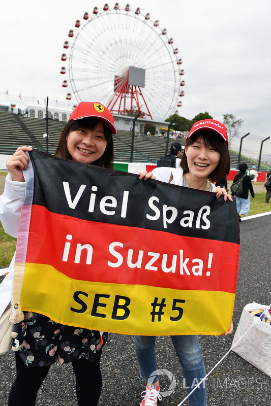 Sebastian Vettel, Ferrari fans and banner