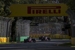 Kevin Magnussen, Haas F1 Team VF-18 Ferrari, leads Romain Grosjean, Haas F1 Team VF-18 Ferrari