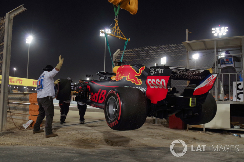 The car of race retiree Daniel Ricciardo, Red Bull Racing RB14 is recovered