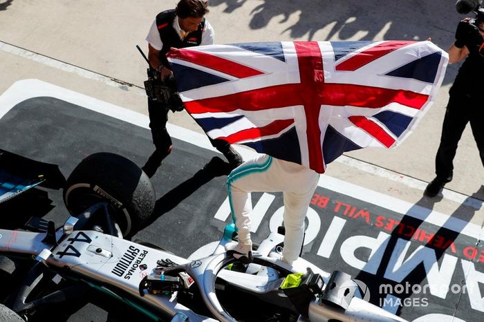 Lewis Hamilton, Mercedes AMG F1, celebrates winning his sixth world championship in parc ferme