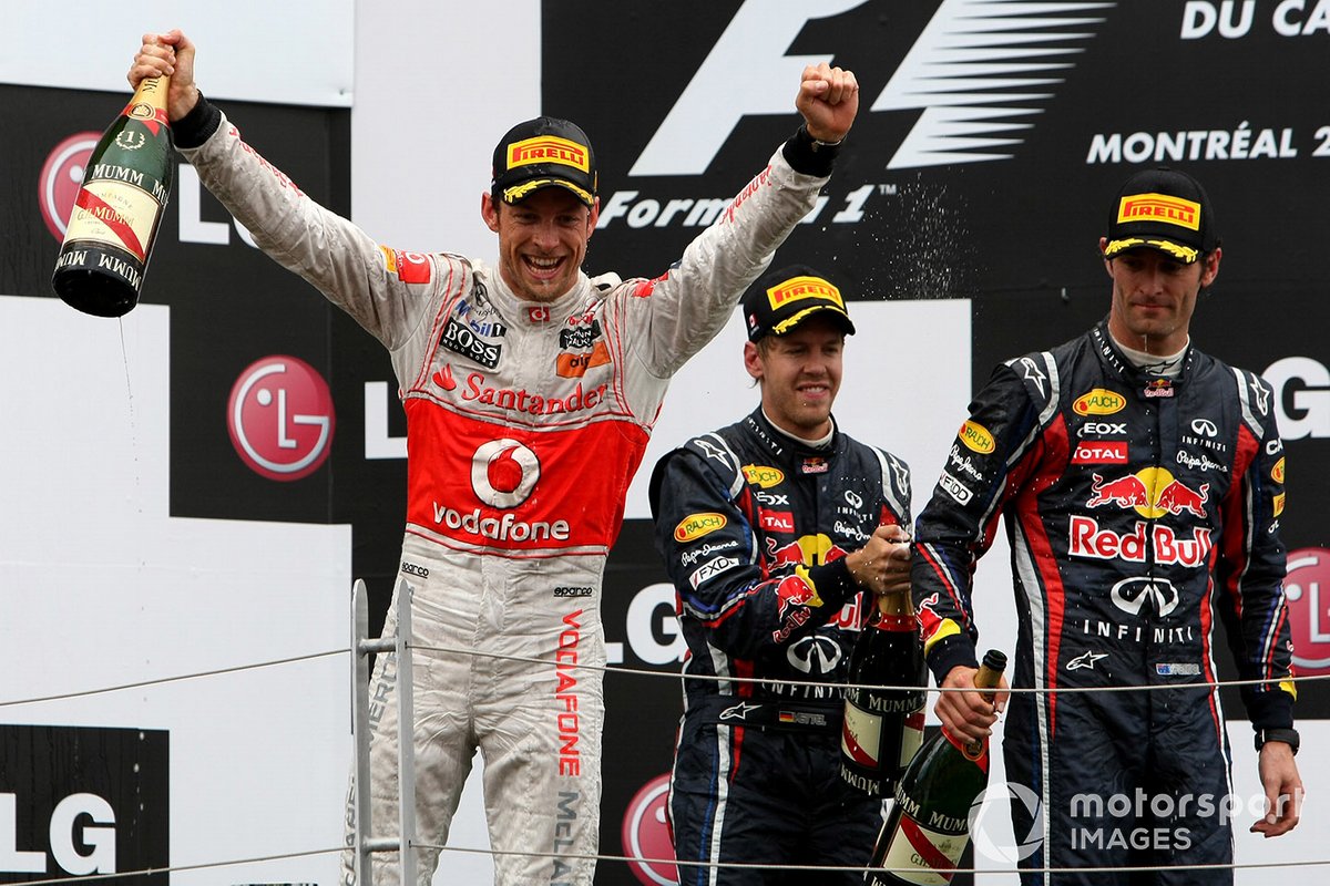 Podium: race winner Jenson Button, McLaren MP4-26 Mercedes, 2nd position Sebastian Vettel, Red Bull Racing RB7 Renault and 3rd position Mark Webber, Red Bull Racing RB7 Renault, celebrate on the podium