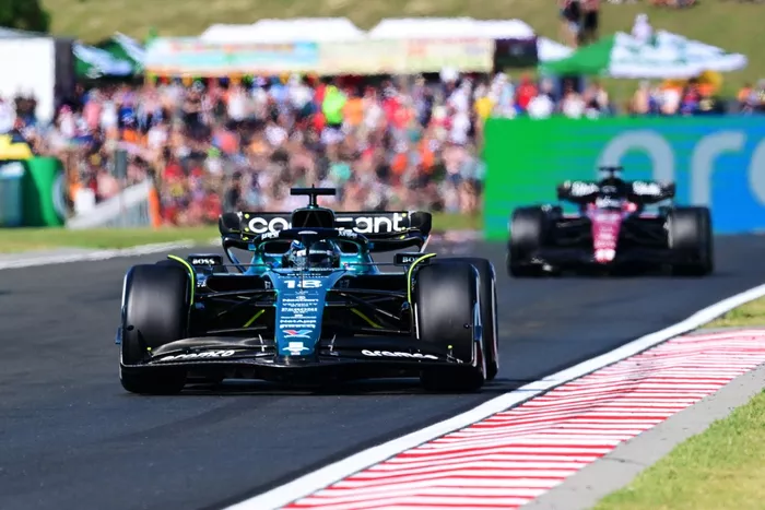 Lance Stroll, Aston Martin AMR23, Zhou Guanyu, Alfa Romeo C43