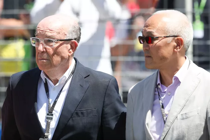 Carmelo Ezpeleta and Derek Chang on the grid together.