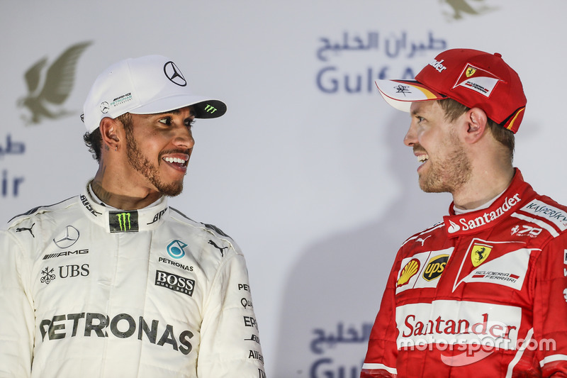 Lewis Hamilton, Mercedes AMG, second place, Sebastian Vettel, Ferrari, race winner, on the podium