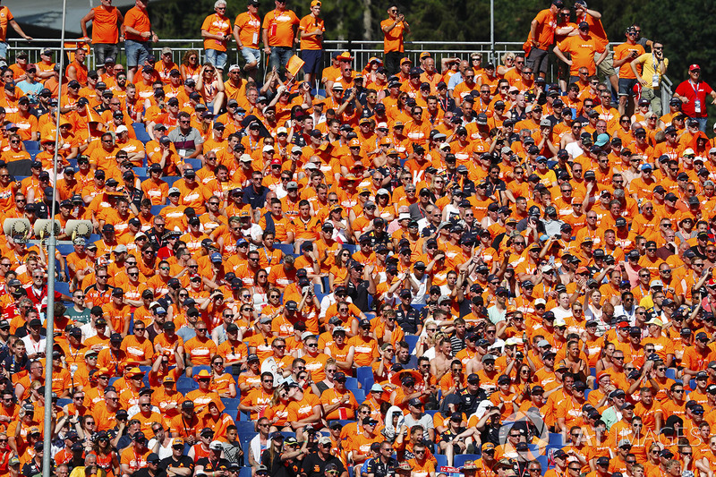 A heavy contingent of Dutch fans in a grandstand