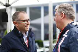 Stefano Domenicali and Otmar Szafnauer, Chief Operating Officer, Force India, in the paddock